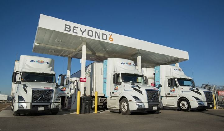 Volvo VNL compressed natural gas tractors are fueled at a nearby, public-access CNG fueling station.