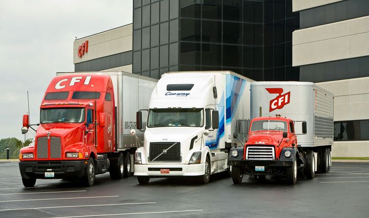 Three trucks staged for CFI's acquisition by Con-way, including an early truck, the original...