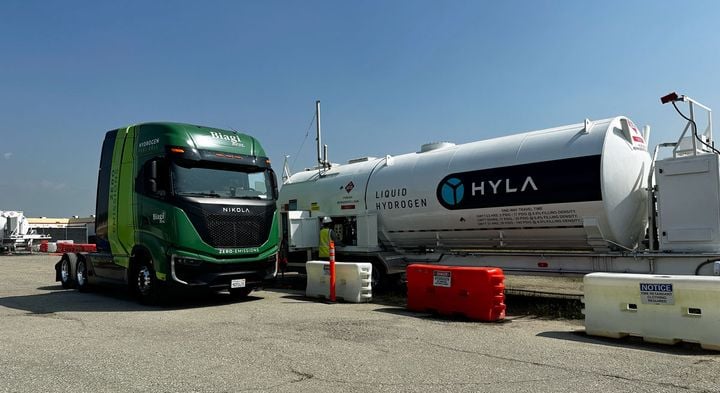 Green Nikola hydrogen fuel cell truck at Hyla fueling station