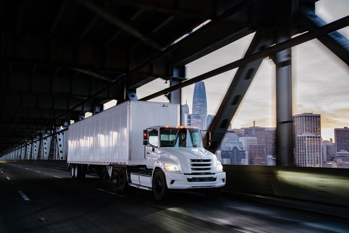 White Tern tractor-trailer on bridge