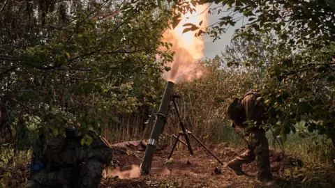 Kostiantyn Liberov/Libkos/Getty Images Soldiers of the assault brigade defend the frontline, which passes through the Ukrainian boarder city of Vovchansk, in Chuhuiv Raion, Kharkiv Oblast