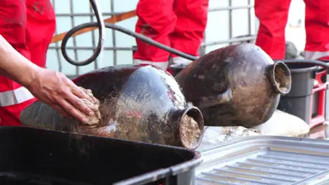 Israel Antiquities Authority Two of the ancient amphorae found on the sea bed