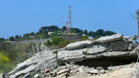 Getty Images The Israeli military post of Hanita is visible from Alma al-Shaab