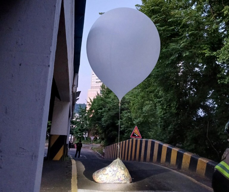 A balloon believed to have been sent by North Korea, carrying various objects including what appeared to be trash, is pictured in Incheon, South Korea, June 2, 2024. Yonhap via REUTERS THIS IMAGE HAS BEEN SUPPLIED BY A THIRD PARTY. NO RESALES. NO ARCHIVES. SOUTH KOREA OUT. NO COMMERCIAL OR EDITORIAL SALES IN SOUTH KOREA. BEST QUALITY AVAILABLE.