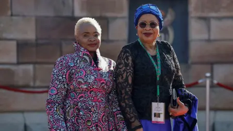 Reuters Graca Machel, widow of former President Nelson Mandela, and her daughter Josina Machel arrive at Mr Ramaphosa's inauguration