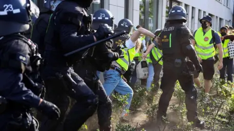 Reuters Police and protesters in Essen