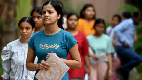 AFP  Candidates leave after appearing for National Eligibility-cum-Entrance Test (NEET-UG) exam at Cambridge school in Sector 27 Noida on May 5, 2024 in India