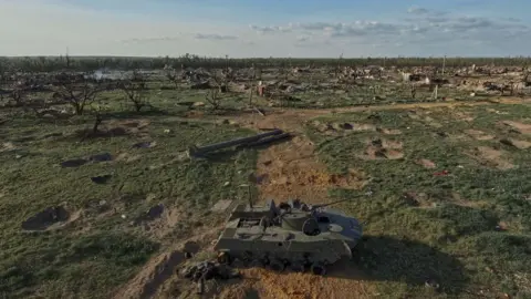 Getty Images Destruction near the village of Krynky in Ukraine