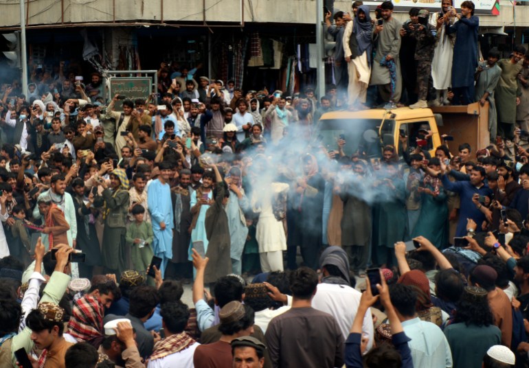 Afghan cricket fans celebrate their team's victory during the men's T20 World Cup cricket match between Afghanistan and Bangladesh, in the city of Khost province eastern of Afghanistan, Tuesday, June. 25, 2024. Afghanistan edged Bangladesh to reach the Twenty20 World Cup semifinals for the first time and followed India into the last four following a combination of results that eliminated 2021 champion Australia on Monday. (AP Photo/Saifullah Zahir)