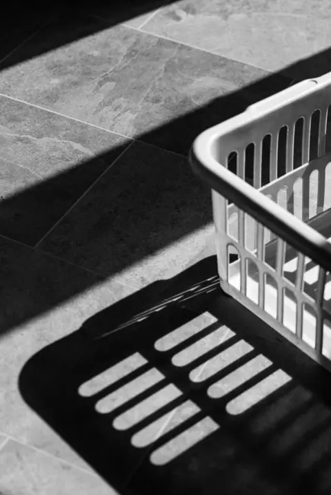 Louise Moon Shadow of a washing basket