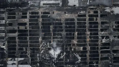 Getty Images Aerial view of a destroyed DIY hypermarket in Kharkiv on 26 May, 2024