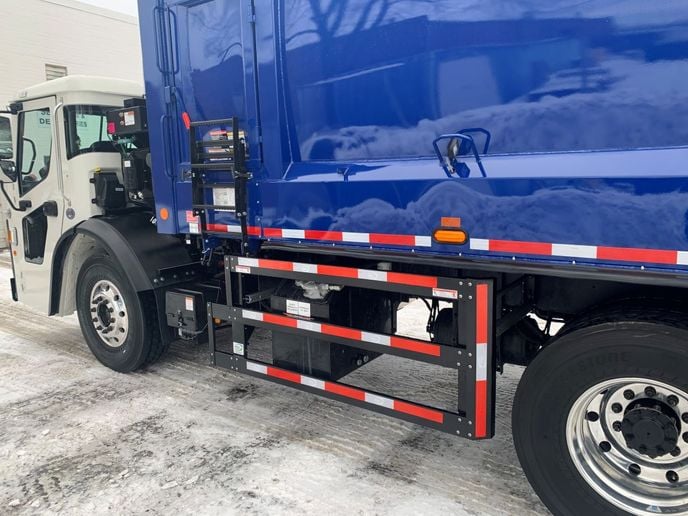 Truck trailer side guard safety barrier.