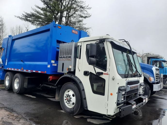 A Mack LR Electric refuse truck in Portland, Maine.