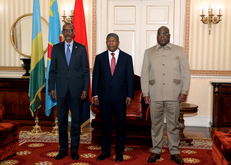 Rwanda President Paul Kagame (L), Angola President Joao Lourenco (C) and Democratic Republic of Congo President Felix Tshisekedi