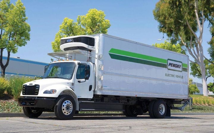 Medium-duty refrigerated box truck with Penske logo