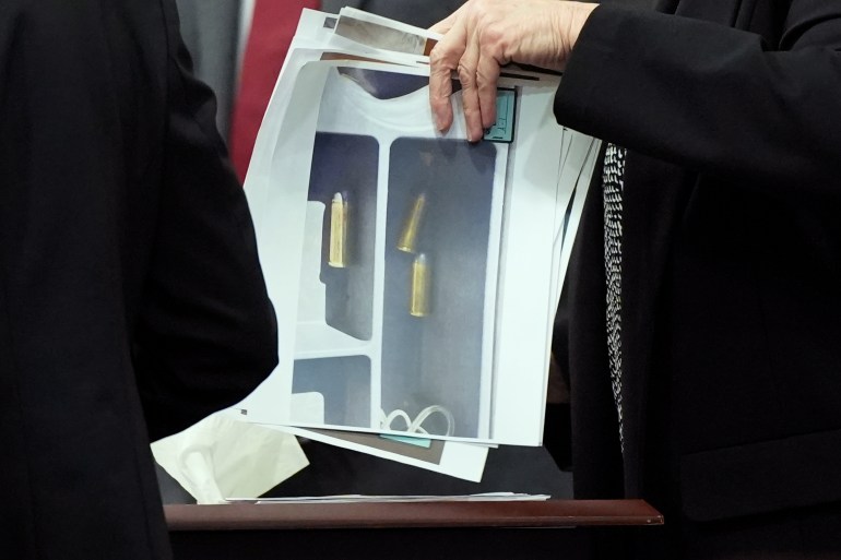 Pictures of evidence are seen during actor Alec Baldwin's trial for