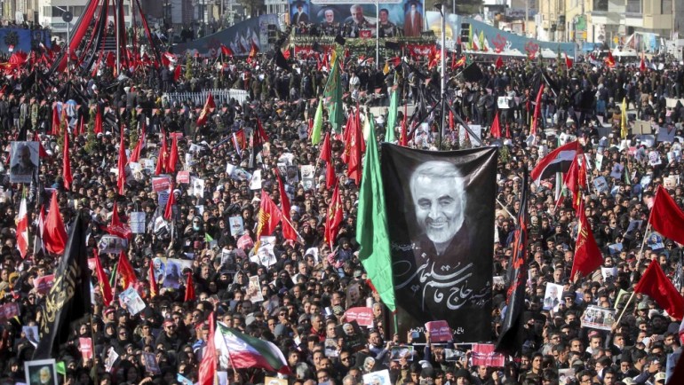 Mourners attend a funeral ceremony for Iranian Gen. Qassem Soleimani and his comrades, who were killed in Iraq in a U.S. drone strike on Friday, in the city of Kerman, Iran, Tuesday, Jan. 7, 2020. The leader of Iran''s Revolutionary Guard threatened on Tuesday to "set ablaze" places supported by the United States over the killing of a top Iranian general in a U.S. airstrike last week, sparking cries from the crowd of supporters of "Death to Israel!" (Erfan Kouchari/Tasnim News Agency via AP)