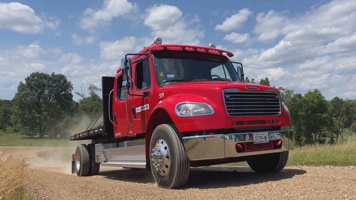 Red 2018 Freightliner M2 vocational truck.