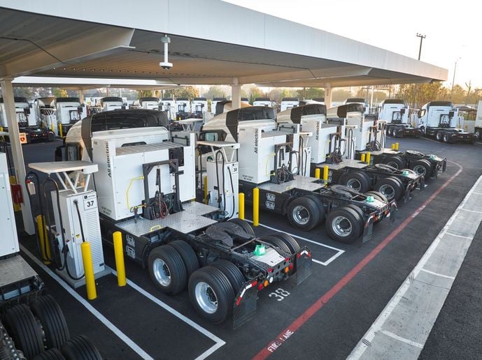 Electric truck at a charging station.