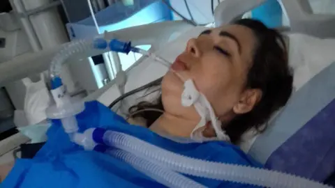 Social media Arezoo Badri being ventilated in a hospital bed