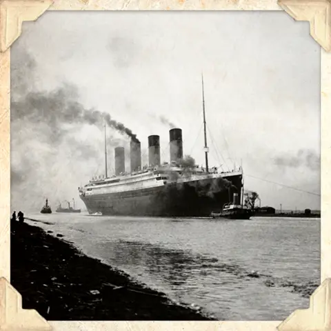 A black and white photo of the RMS Titanic leaving Belfast for sea trials, 1912 (Getty Images)