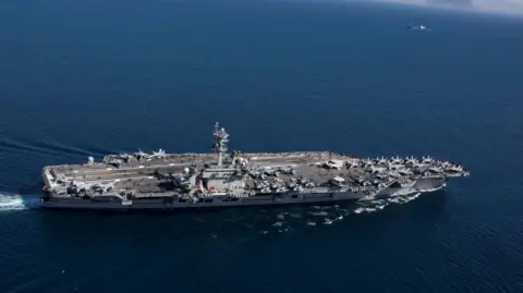 Reuters The Nimitz-class aircraft carrier USS Abraham Lincoln (CVN 72) transits the Strait of Gibraltar, entering the Mediterranean Sea as it continues operations in the 6th Fleet area of responsibility in this April 13, 2019 photo supplied by the U.S. Navy