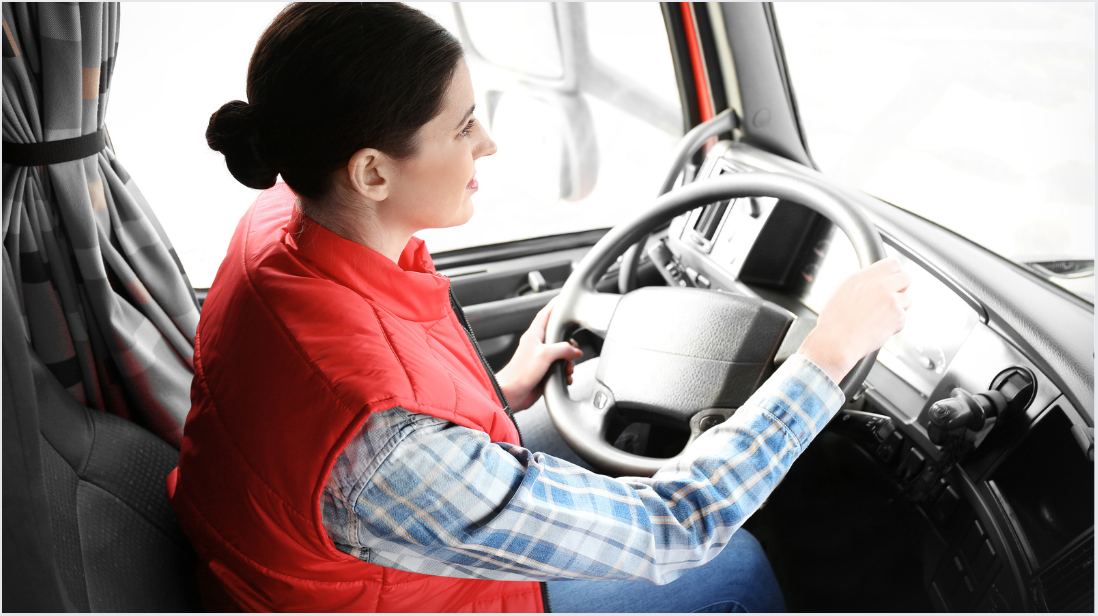 Female-trucker-red-vest-cab-1200x628