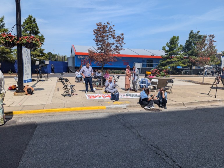 Uncommitted delegates stage a sit-in outside the Democratic National Convention in Chicago, August 22, 2024