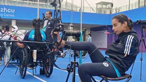 Abhilasha Chaudhary Sheetal Devi practices her shot at a world tournament