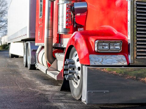 red truck parked 1200x628.jpg