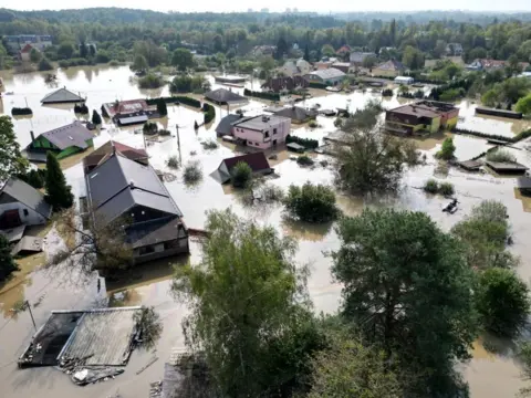 Reuters A drone view shows the flood-affected area in Ostrava, many houses are submerged entirely or up to the second floor