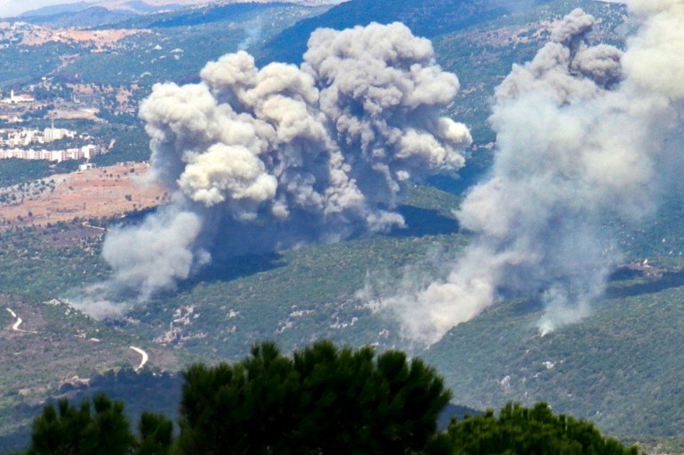 Smoke billows from the site of an Israeli airstrike that targeted southern Lebanese