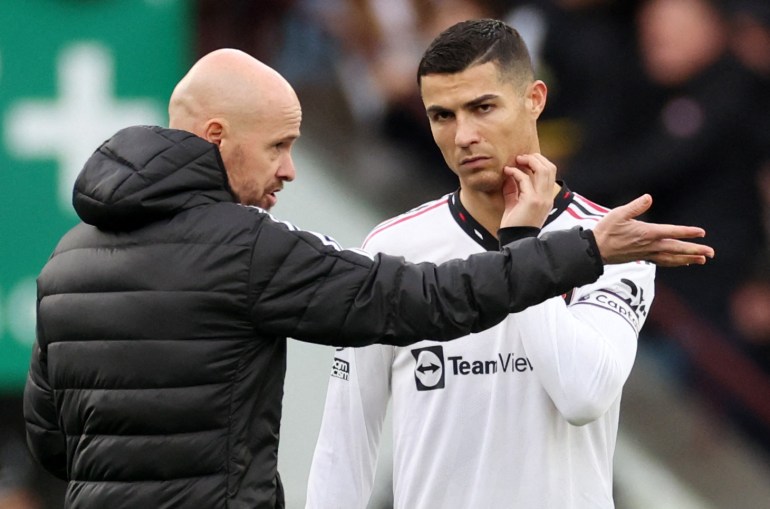 Soccer Football - Premier League - Aston Villa v Manchester United - Villa Park, Birmingham, Britain - November 6, 2022 Manchester United manager Erik ten Hag talks to Cristiano Ronaldo before the start of the second half REUTERS/Carl Recine EDITORIAL USE ONLY. No use with unauthorized audio, video, data, fixture lists, club/league logos or 'live' services. Online in-match use limited to 75 images, no video emulation. No use in betting, games or single club /league/player publications. Please contact your account representative for further details.