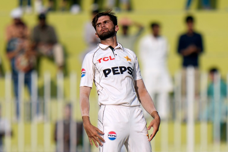 Pakistan's Shaheen Shah Afridi celebrates after taking the wicket of Bangladesh's Mehidy Hasan Mirza during the fourth day of first cricket test match between Pakistan and Bangladesh, in Rawalpindi, Pakistan, Saturday, Aug. 24, 2024. (AP Photo/Anjum Naveed)