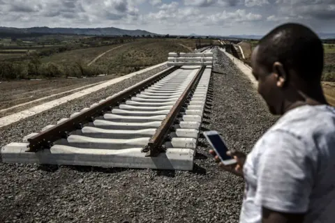 Getty Images Incomplete rail tracks for the Standard Gauge Railway (SGR) line lay on the ground in Kenya - May 2019