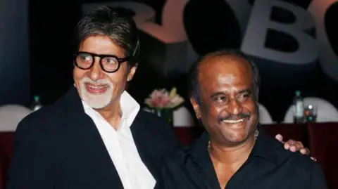 Getty Images Amitabh Bachchan and Rajinikanth during the music launch of the film 'Robot' in Mumbai on August 14, 2010