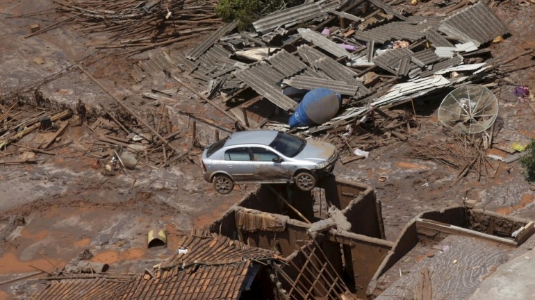 Debris is pictured in Bento Rodigues district which was covered with mud after a dam owned by Vale SA and BHP Billiton Ltd burst, in Mariana