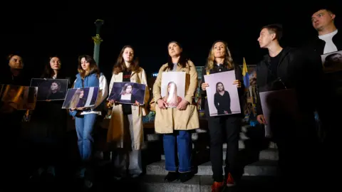 SERGEY DOLZHENKO/EPA Former colleagues held a vigil in Kyiv to remember Viktoriia Roshchyna