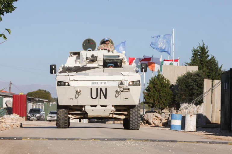 A UN vehicle drives, during a Reuters' visit at Camp Shamrock where Irish and Polish peacekeepers of the United Nations Interim Force in Lebanon (UNIFIL) are stationed near Maroun al-Ras village close to the Lebanese-Israeli border, in southern Lebanon November 29, 2023. [Aziz Taher/Reuters]