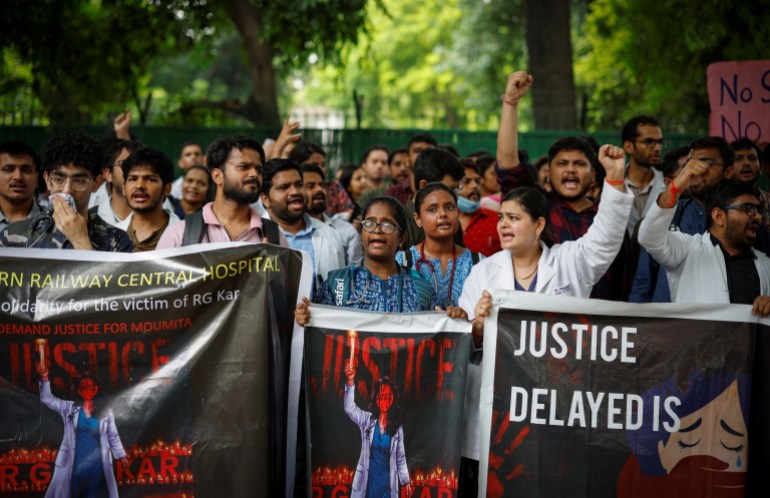 Doctors shout slogans during a protest demanding justice following the rape and murder of a trainee medic at a hospital in Kolkata, in New Delhi, India