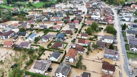 Reuters A drone view shows a flooded residential area in Kiseljak, Bosnia and Herzegovina