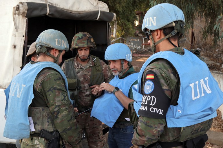 Spanish peacekeepers of the United Nations Interim Force in Lebanon (UNIFIL) coordinate their patrol with the Lebanese army, in Marjayoun in south Lebanon on October 8