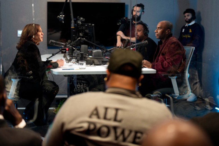 Charlamagne tha God interviews Kamala Harris in a radio studio