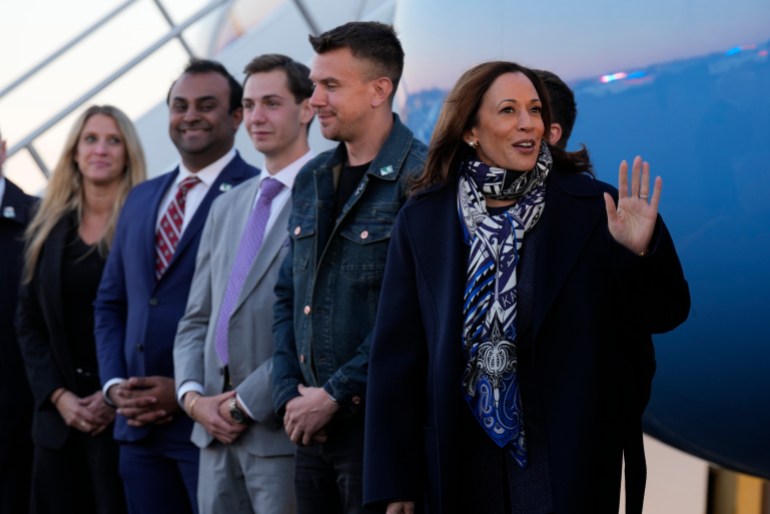 Democratic presidential nominee Vice President Kamala Harris waves at Trenton-Mercer Airport, in Mercer County, N.J., before departing en route to Milwaukee, Wednesday, Oct. 16, 2024. 