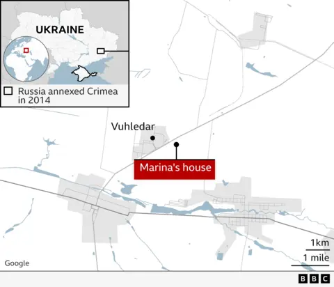 Map showing the location of Vuhledar in eastern Ukraine and the position of Marina's house.