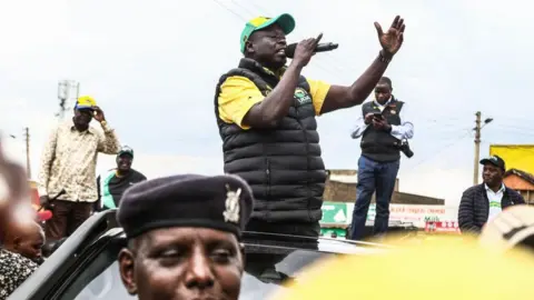 Getty Images Rigathi Gachagua speaks to supporters who thronged his party campaign rally at Salgaa Trading Centre 