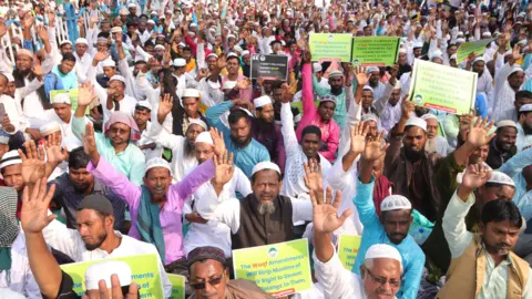 Getty Images KOLKATA, INDIA - NOVEMBER 19, 2024: Muslim taking part during a rally to protest against Waqf (an Islamic endowment of property to be held in trust and used for a charitable or religious purpose) (Photo credit should read Dipa Chakraborty/ Pixelnews/Future Publishing via Getty Images)
