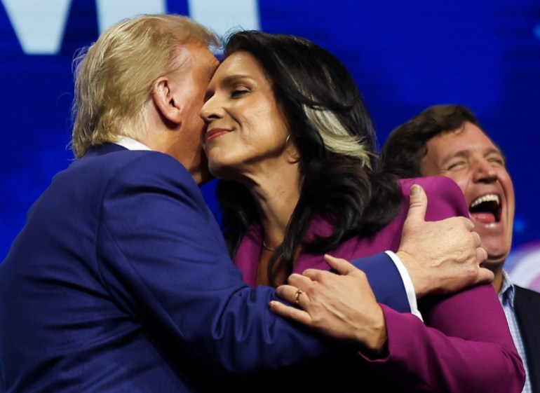 Tulsi Gabbard hugs Donald Trump