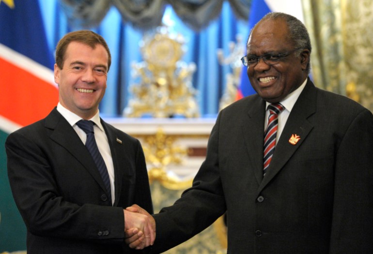 Russian President Dmitry Medvedev, left, and Namibian President Hifikepunye Pohamba shake hands prior their talks in Moscow's Kremlin, Russia, Thursday, May 20, 2010. Russia is returning on the African continent as its close partner after a break due to our internal difficulties_Medvedev said at the talks with Namibian President Hifikepynye Lucas Pohamba on Thursday. (AP Photo/Alexander Zemlianichenko, pool)