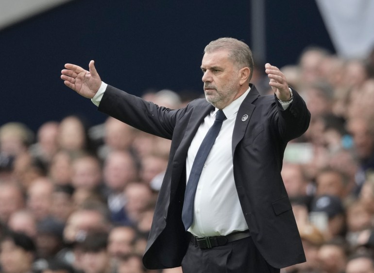 Tottenham's head coach Ange Postecoglou reacts during the English Premier League soccer match between Tottenham Hotspur and West Ham United , at the Tottenham Hotspur Stadium in London, Saturday, Oct 19, 2024. (AP Photo/Dave Shopland)